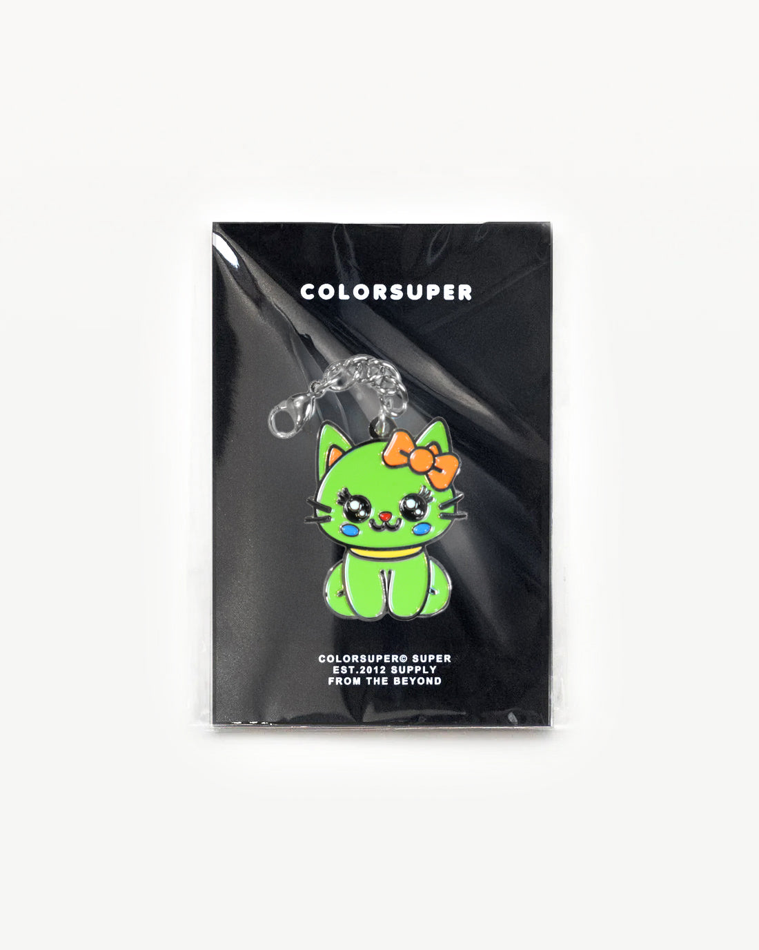 Cute green cat charm with a red bow, packaged and ready to give off cool-cat vibes. - Alternate view