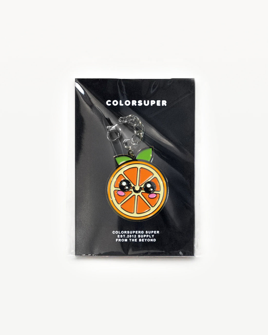 Juicy Fruit Orange charm with happy face, vibrant colors, packaged for display, adding cheerful energy. - Alternate view