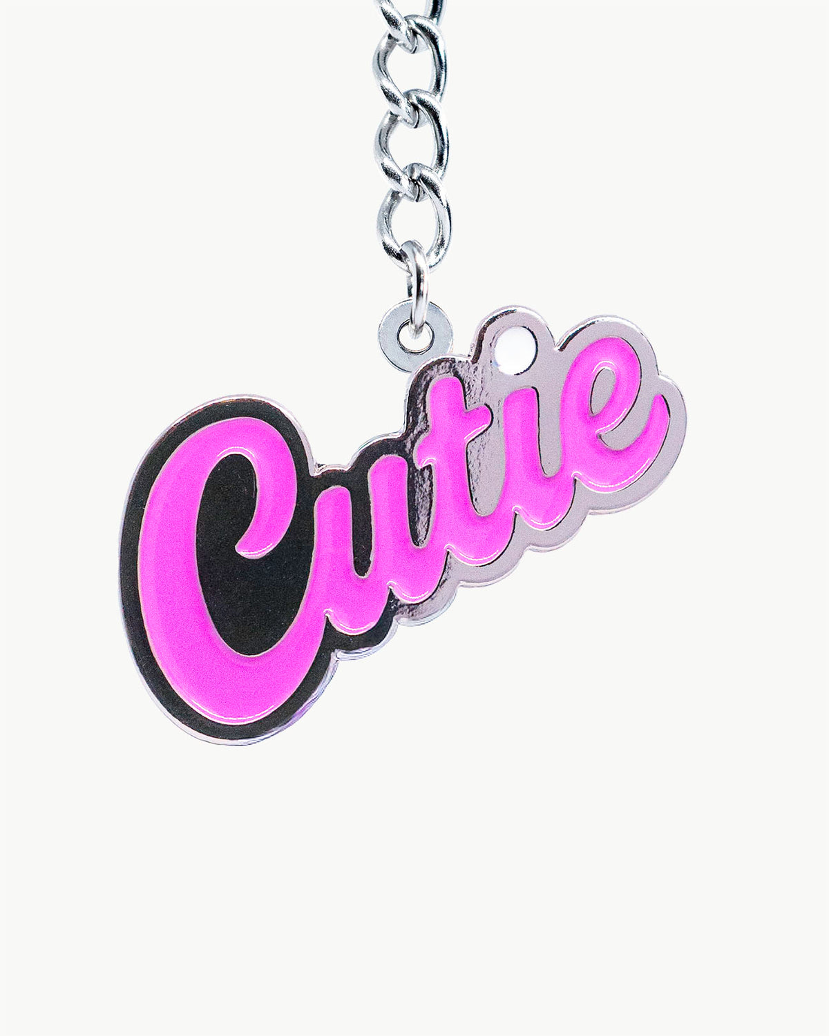 Bikini Charm - Cutie Pink Charm featuring vibrant pink "Cutie" script enamel accessory.