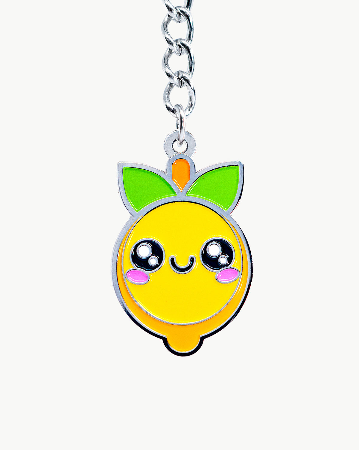 Bright yellow Juicy Fruit Lemon charm with cute smiling face and green leaves, perfect for a fun accessory.