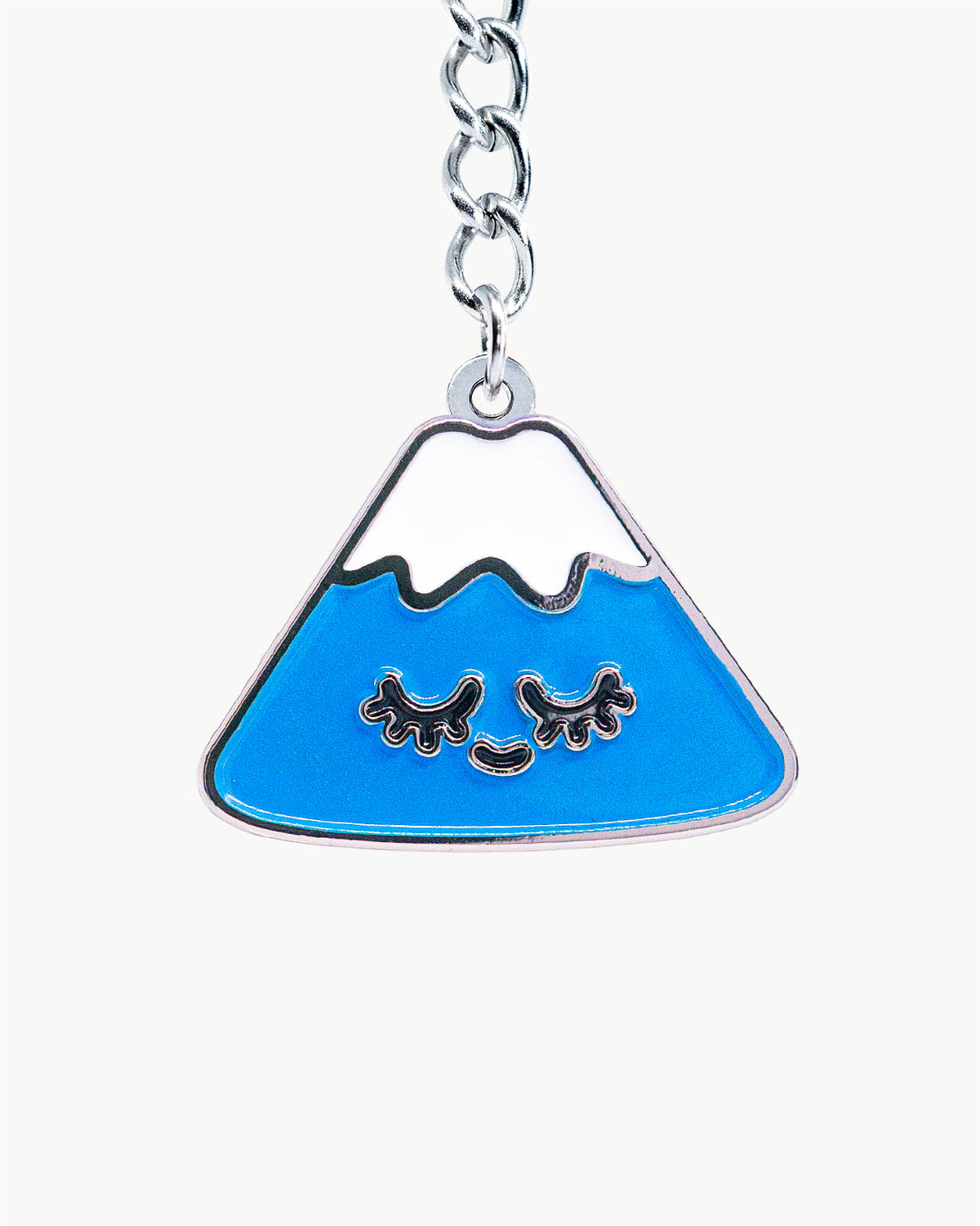 Bikini Charm - Summit Charm featuring a blue mountain with a smiling face, perfect for swimwear personalization.