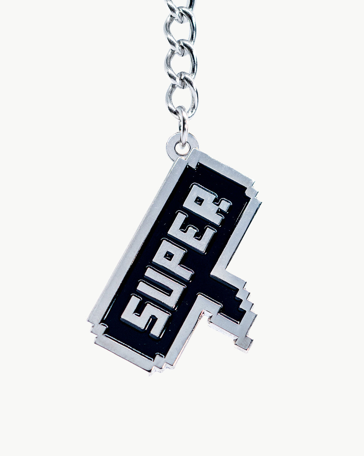 Retro 8-bit pixelated charm featuring 'SUPER' text, perfect for gamers and beach accessories.