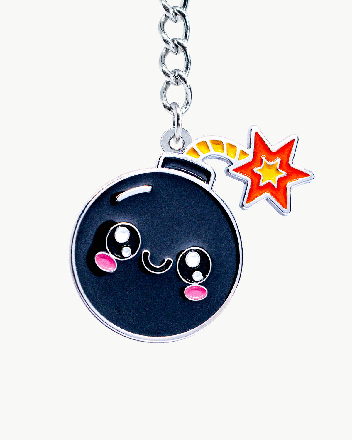 Bikini Charm - Bomb Charm featuring a cute black bomb with a smiling face and a lit fuse on a chain.
