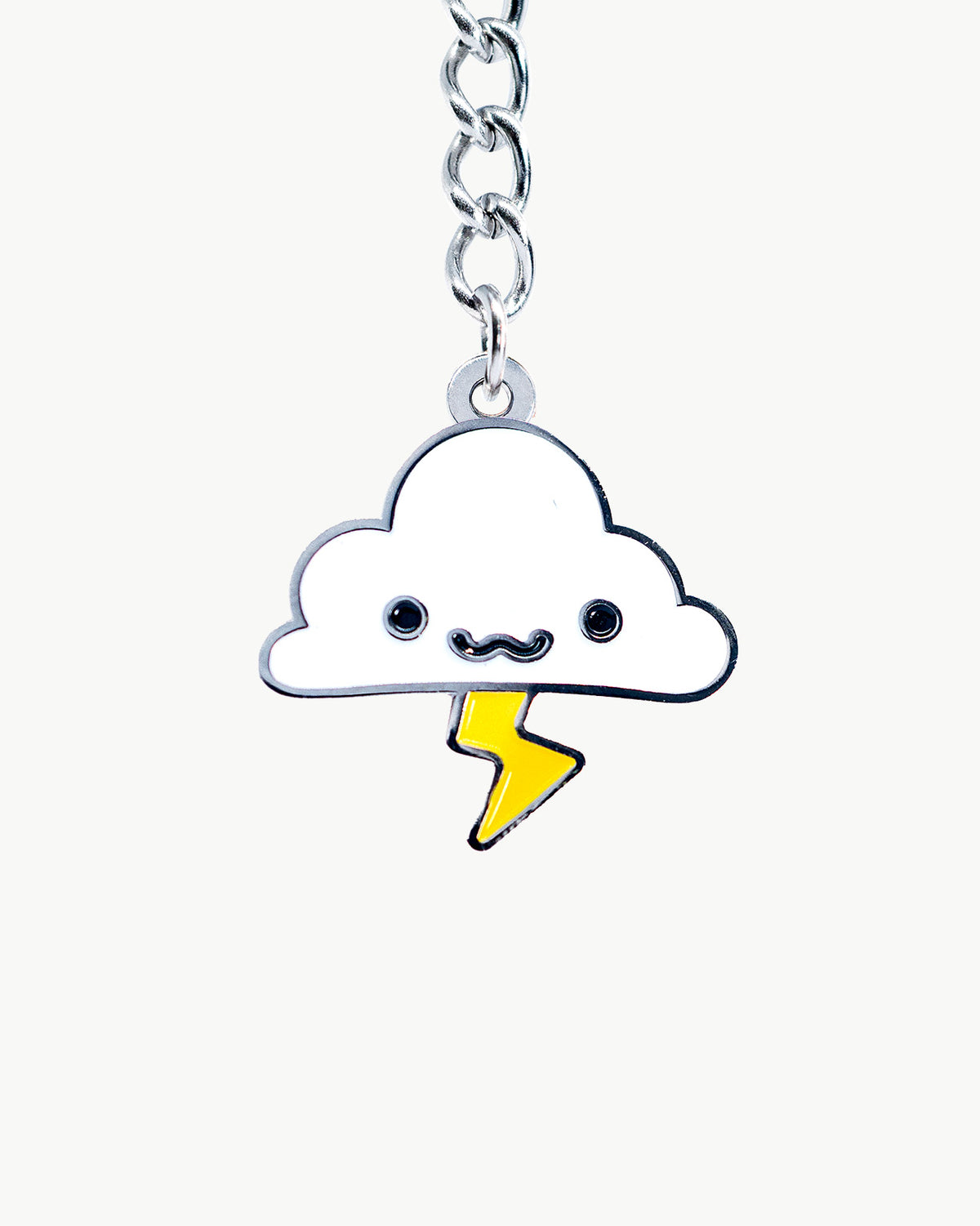 Kawaii cloud charm featuring a cute face and lightning bolt, perfect for whimsical accessory lovers.