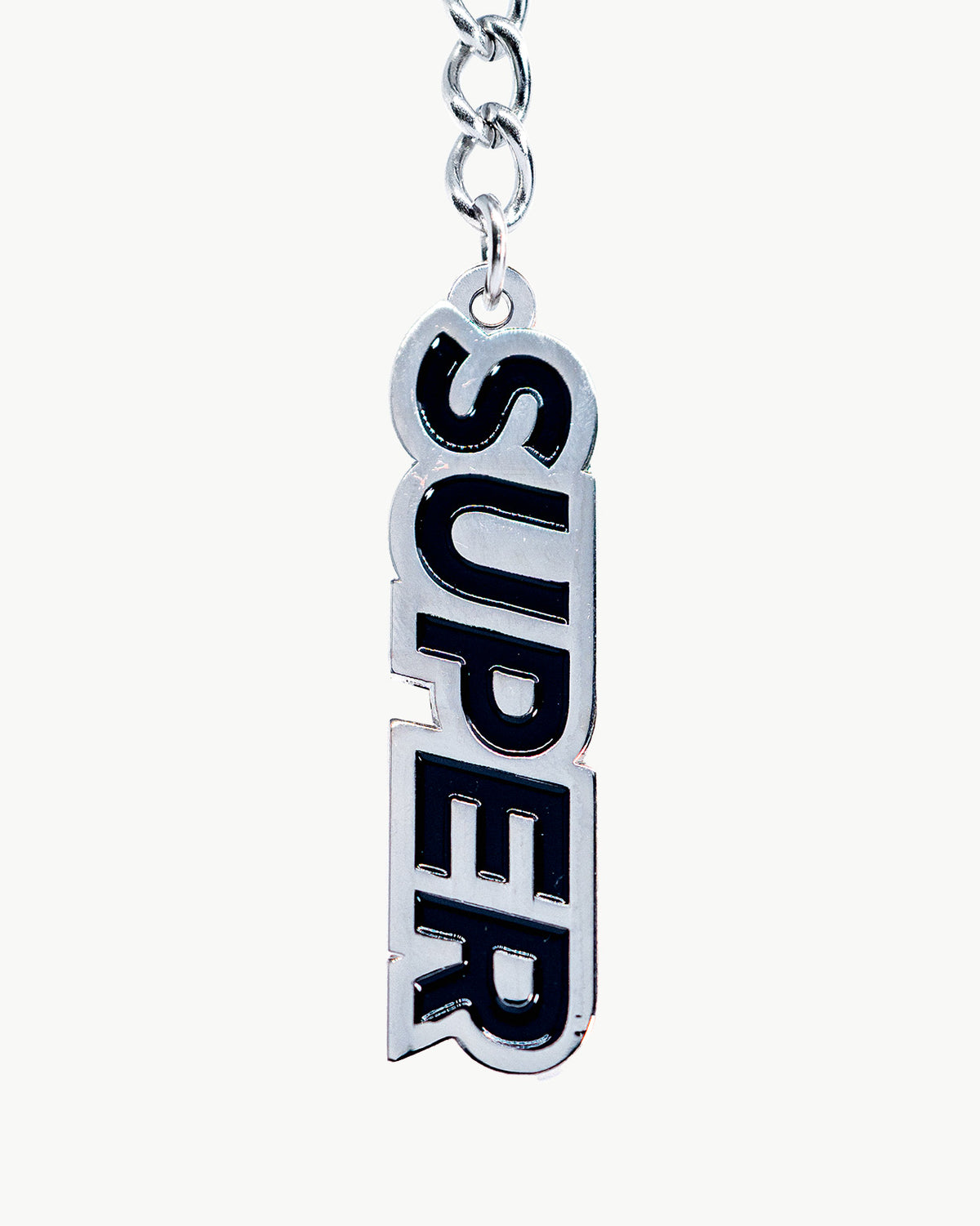 Super black bikini charm pendant adding minimalist style to summer swimwear accessories.