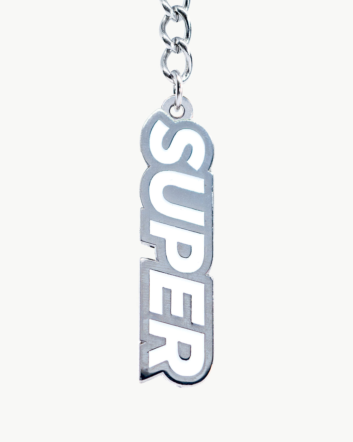 Super White Bikini Charm with sleek silver 'SUPER' design, perfect for a minimalist summer style.