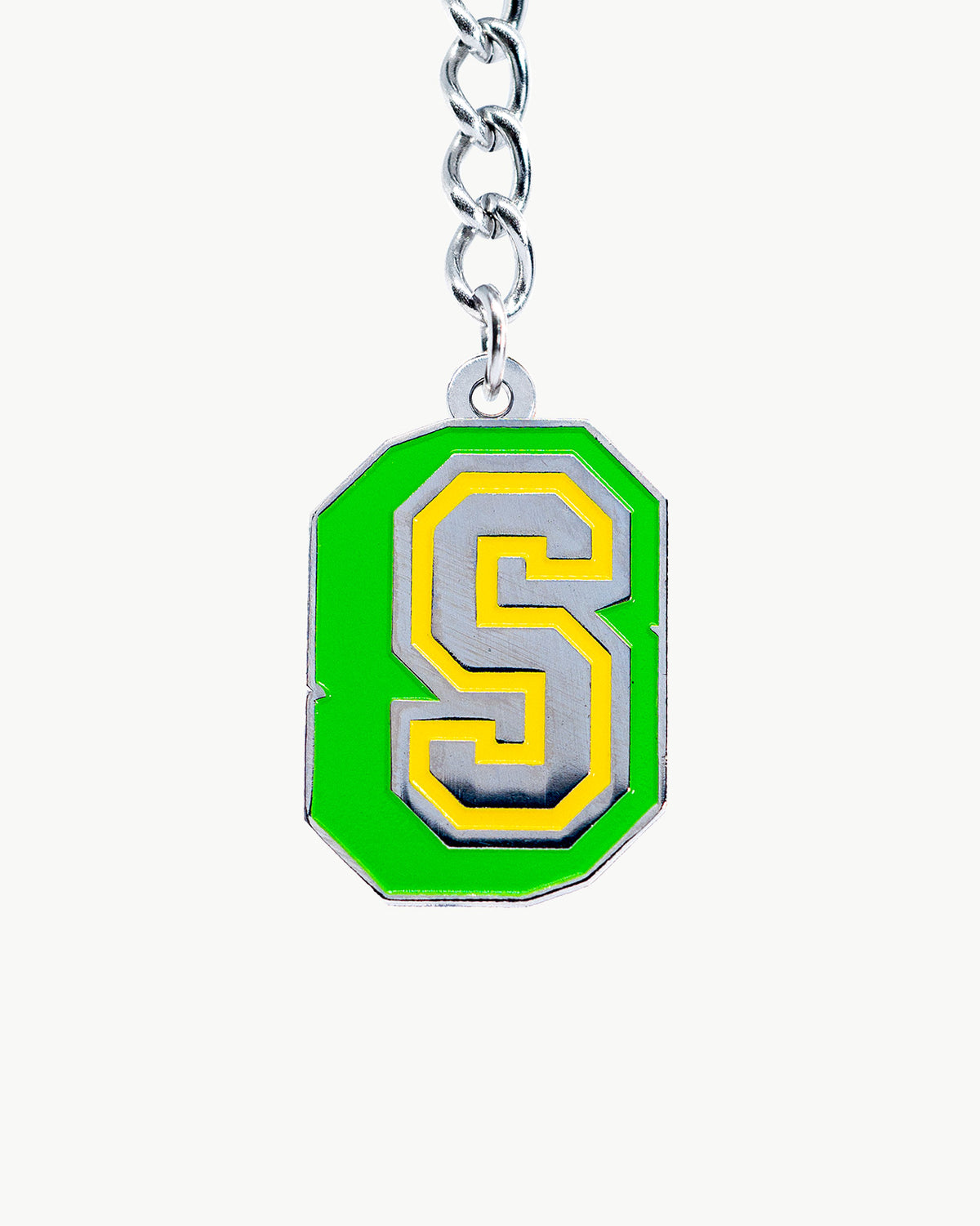 Vibrant S charm in college font with yellow and green colors, perfect for a samba-themed collection.
