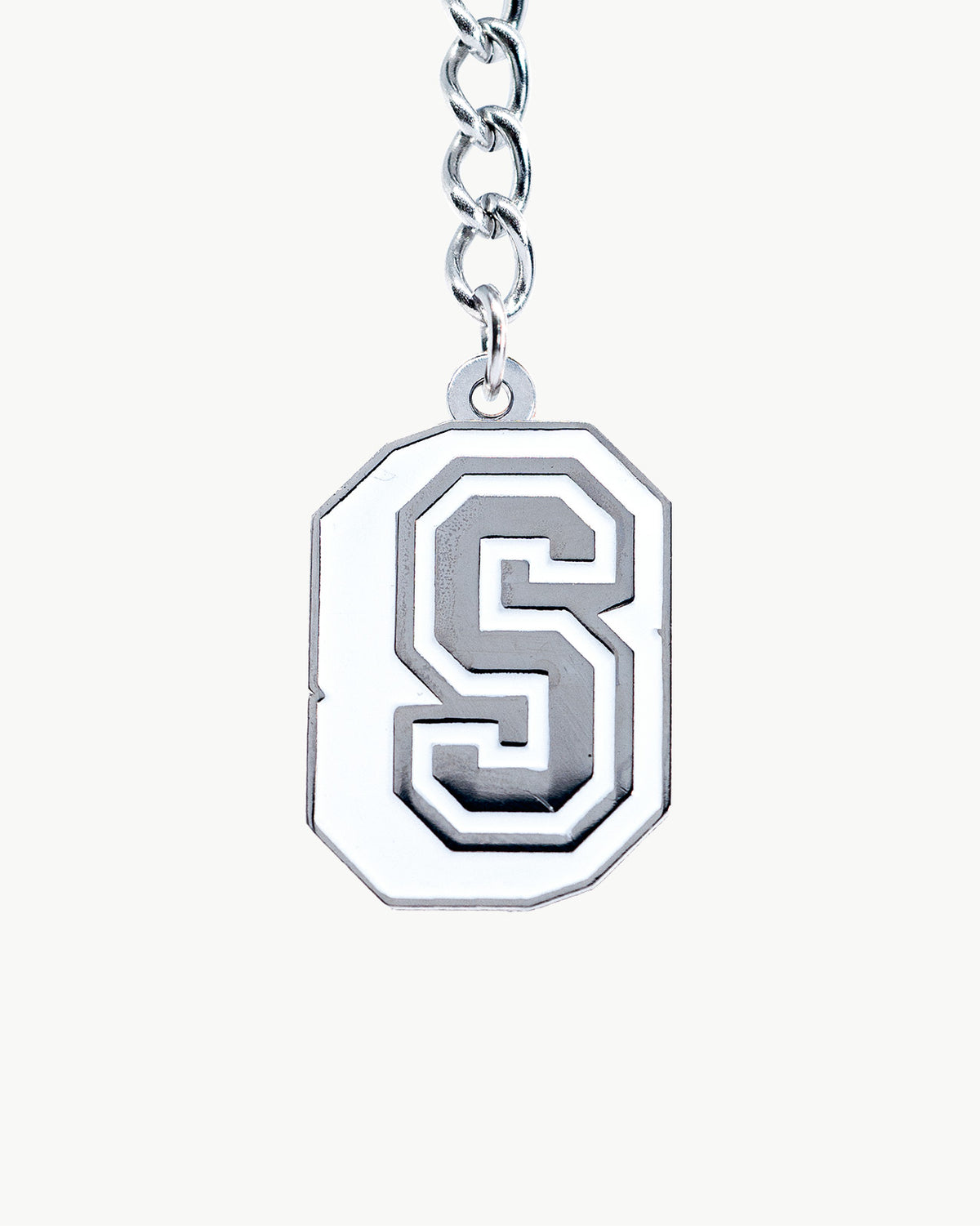 Bikini Charm featuring a collegiate-style 'S' in classic white and chrome design, ideal for academic-themed accessories.