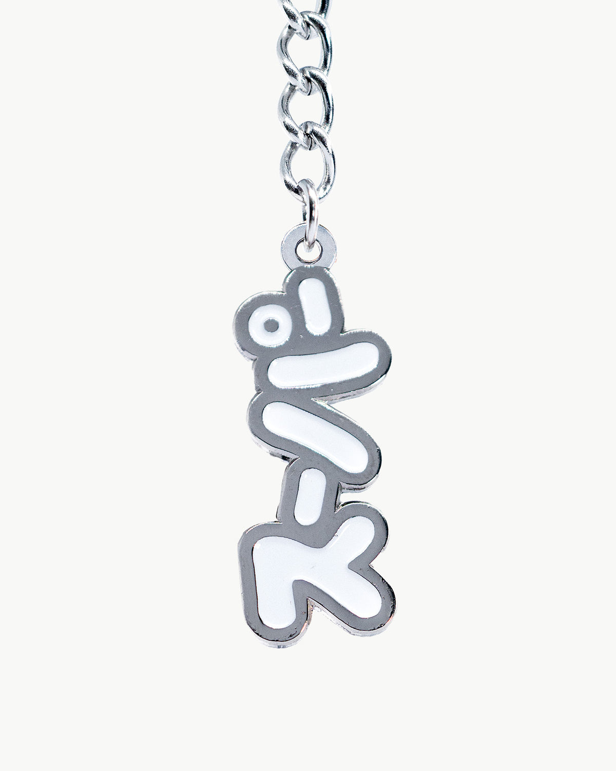 Japanese super bikini charm in silver with a quirky design, perfect for trendy swimwear accessories.