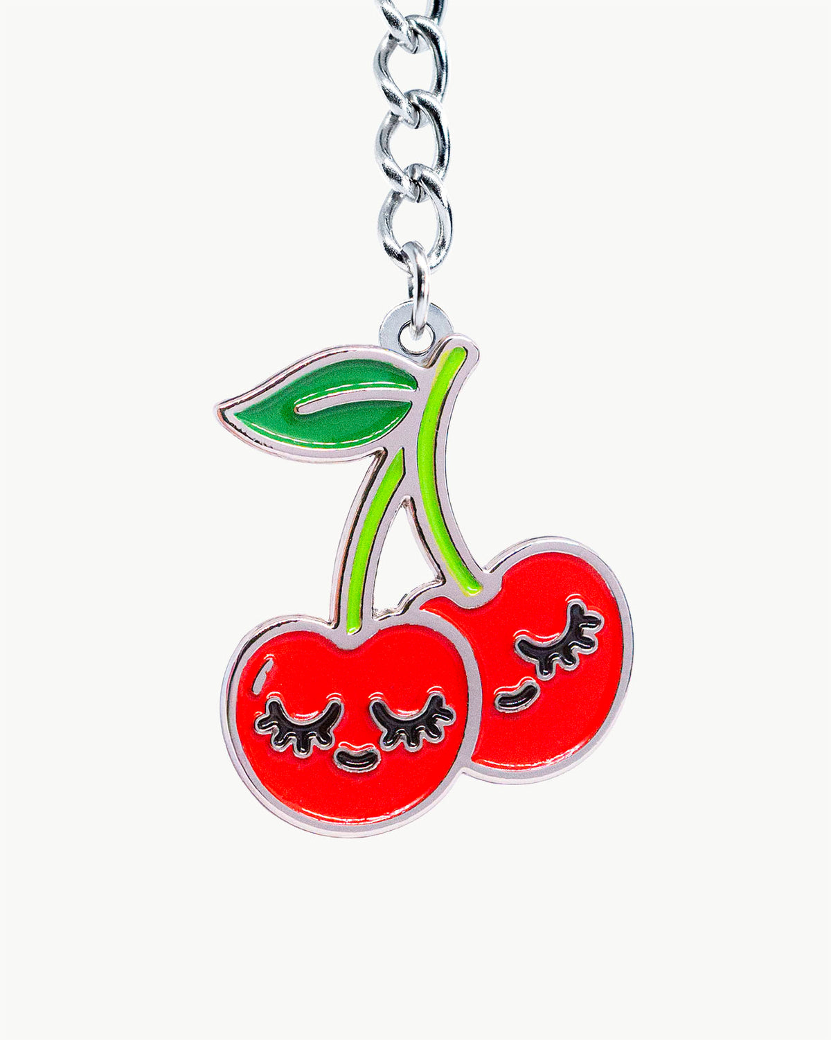 Bikini Charm - Twin Cherry Charm featuring red cherries with smiling faces and green leaves, perfect for beachwear.