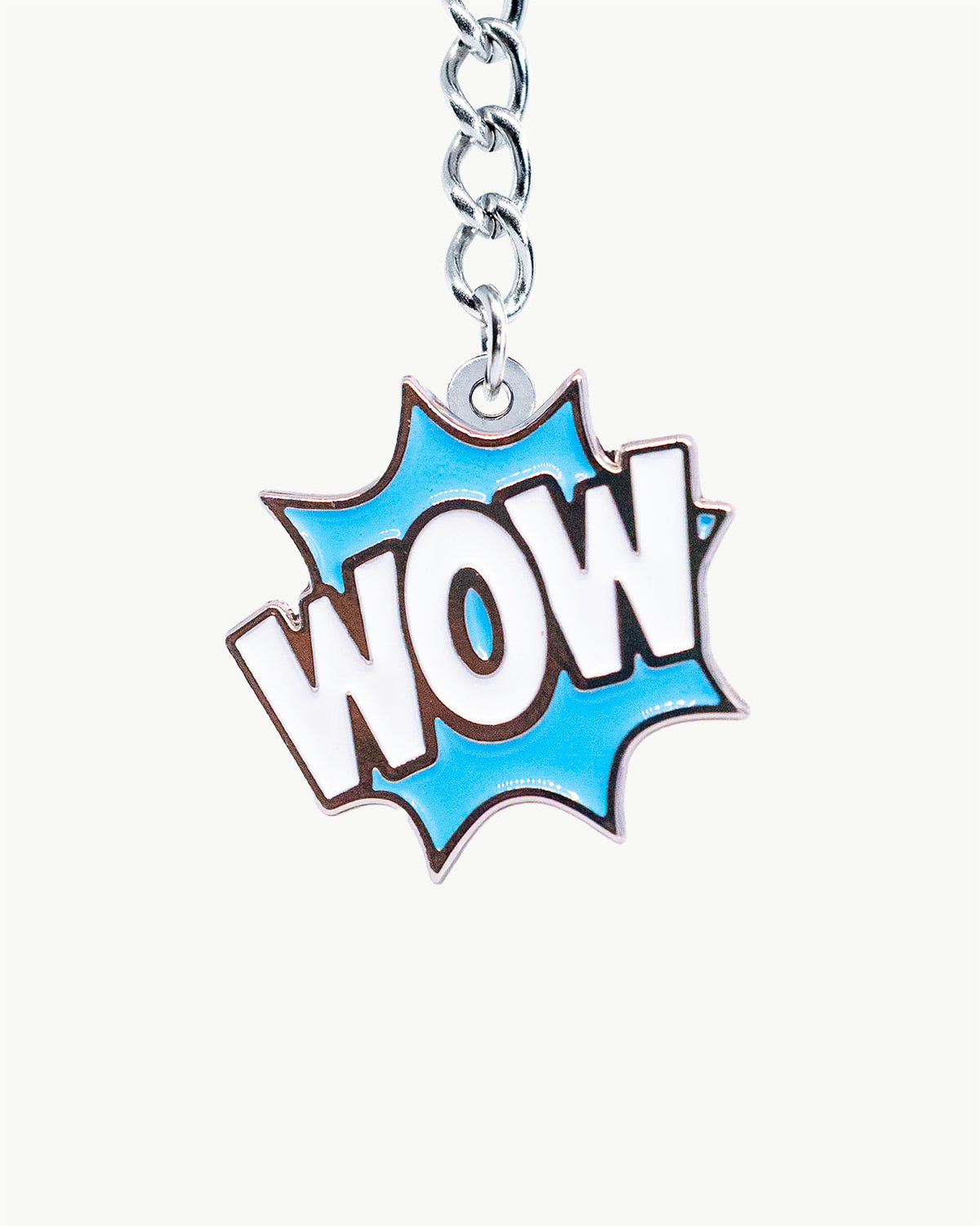 Bikini Charm - Wow (Blue) Charm featuring a comic-book "WOW" explosion in blue and white enamel.