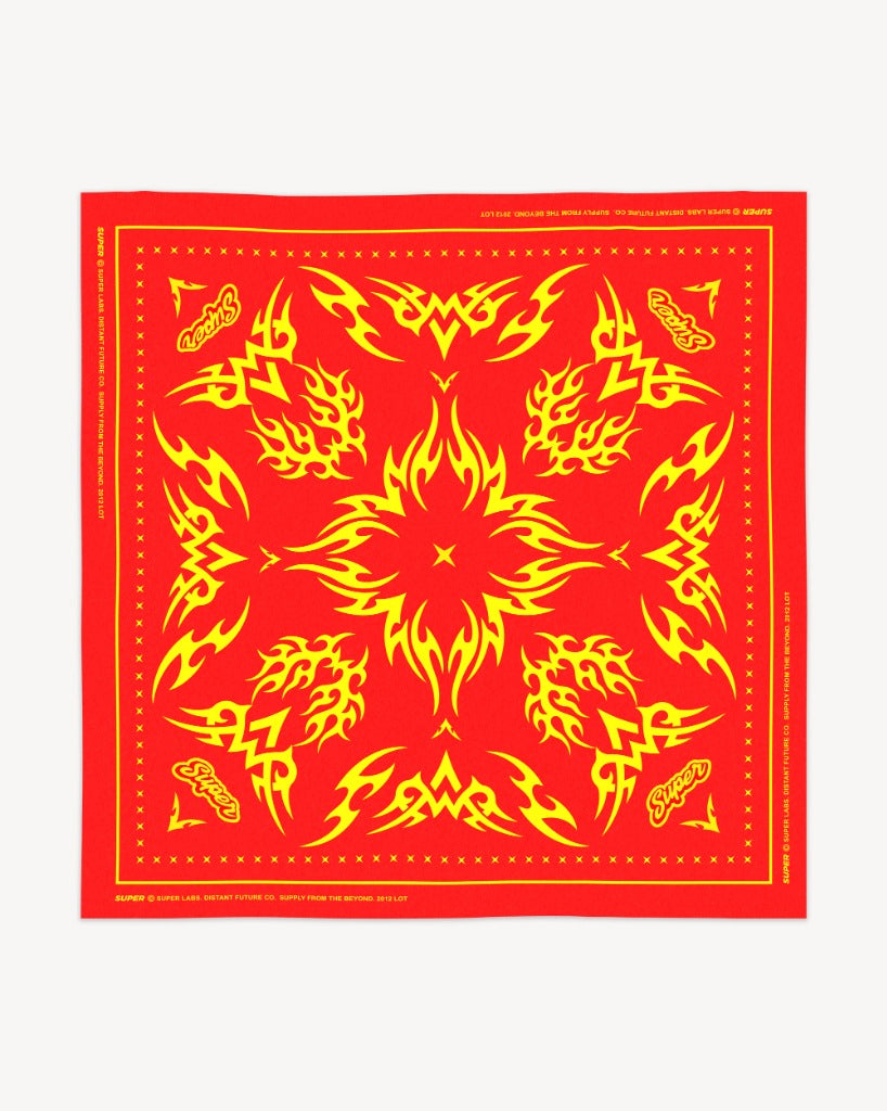 Red square bandana, flat lay. Yellow tribal flame patterns, 'Super' text, and a yellow border with 'x' marks and branding.