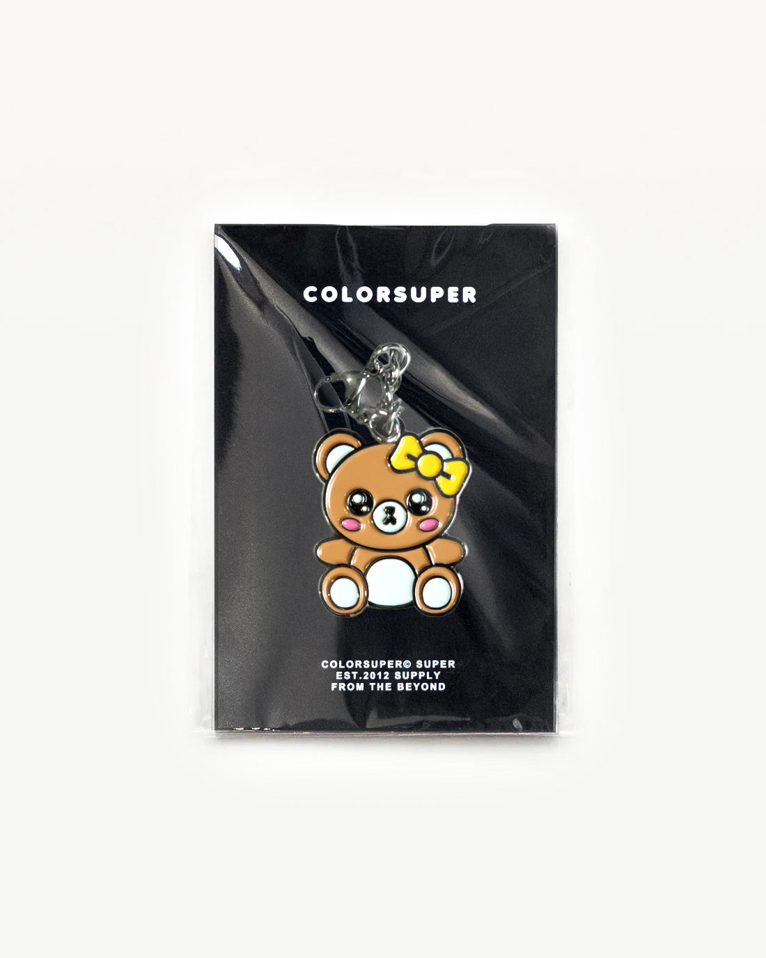 Cute Bear charm with a big bow, designed for everyday style and soft vibes, showcased in clear packaging. - Alternate view