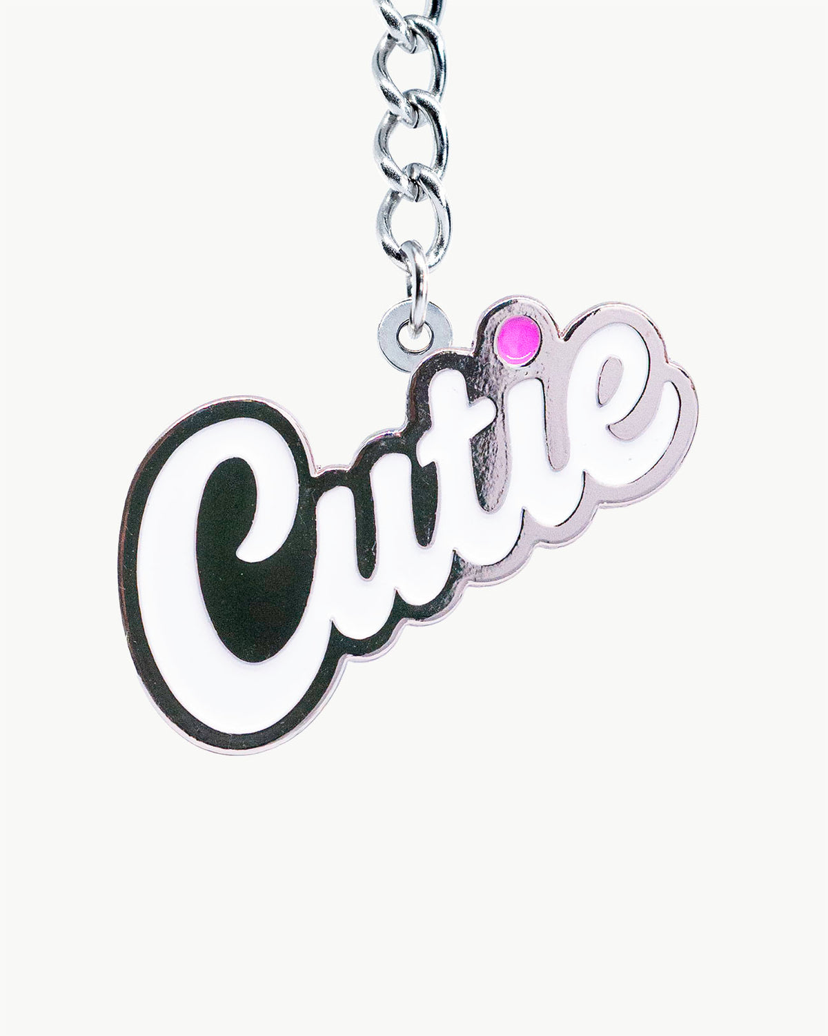 Bikini Charm - Cutie Chrome Charm featuring a polished silver script with a vibrant pink accent, perfect for stylish swimwear.