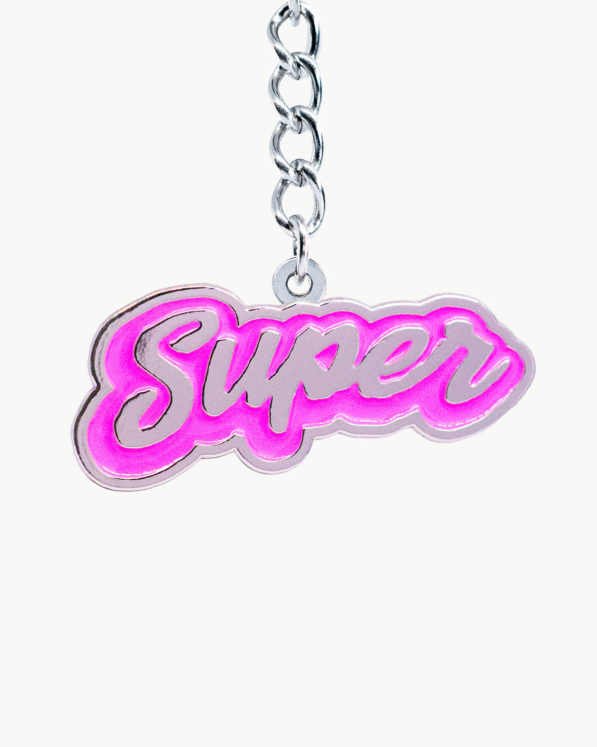 Bikini Charm - Wipeout (Pink) Charm featuring the vibrant pink 'Super' script on an enamel accessory.