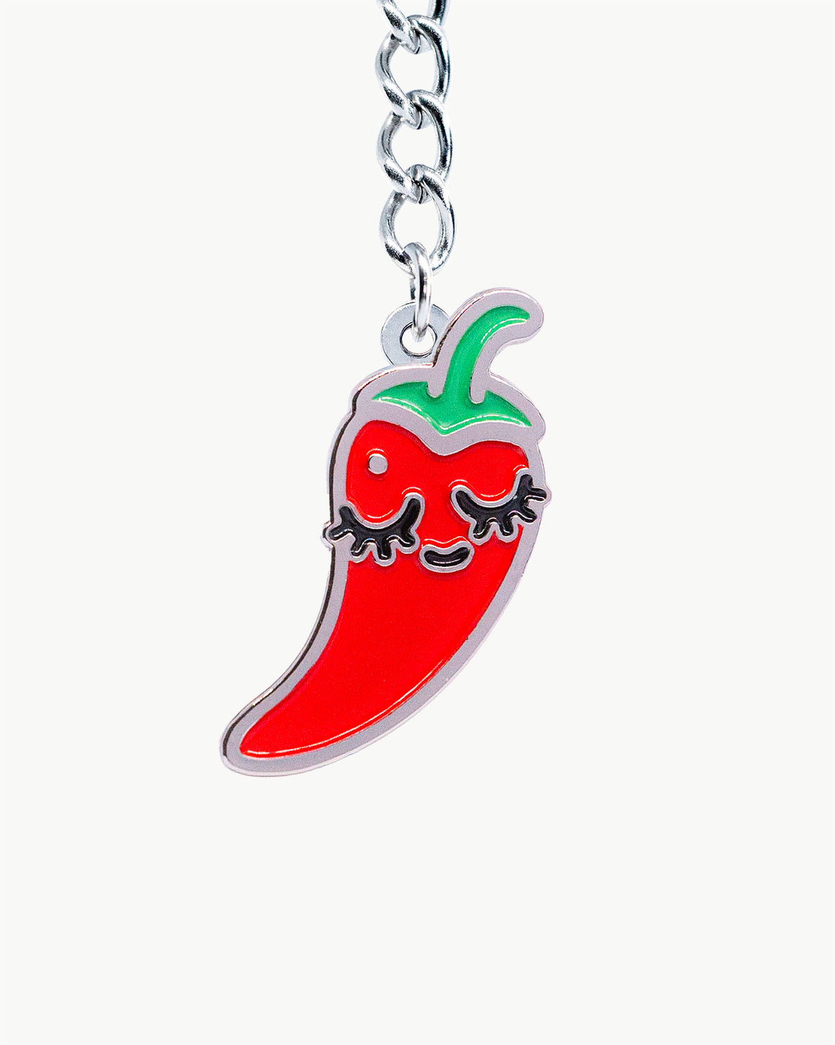 Bikini Charm - Spicy Charm featuring a red chili pepper charm with a smiling face and green stem.