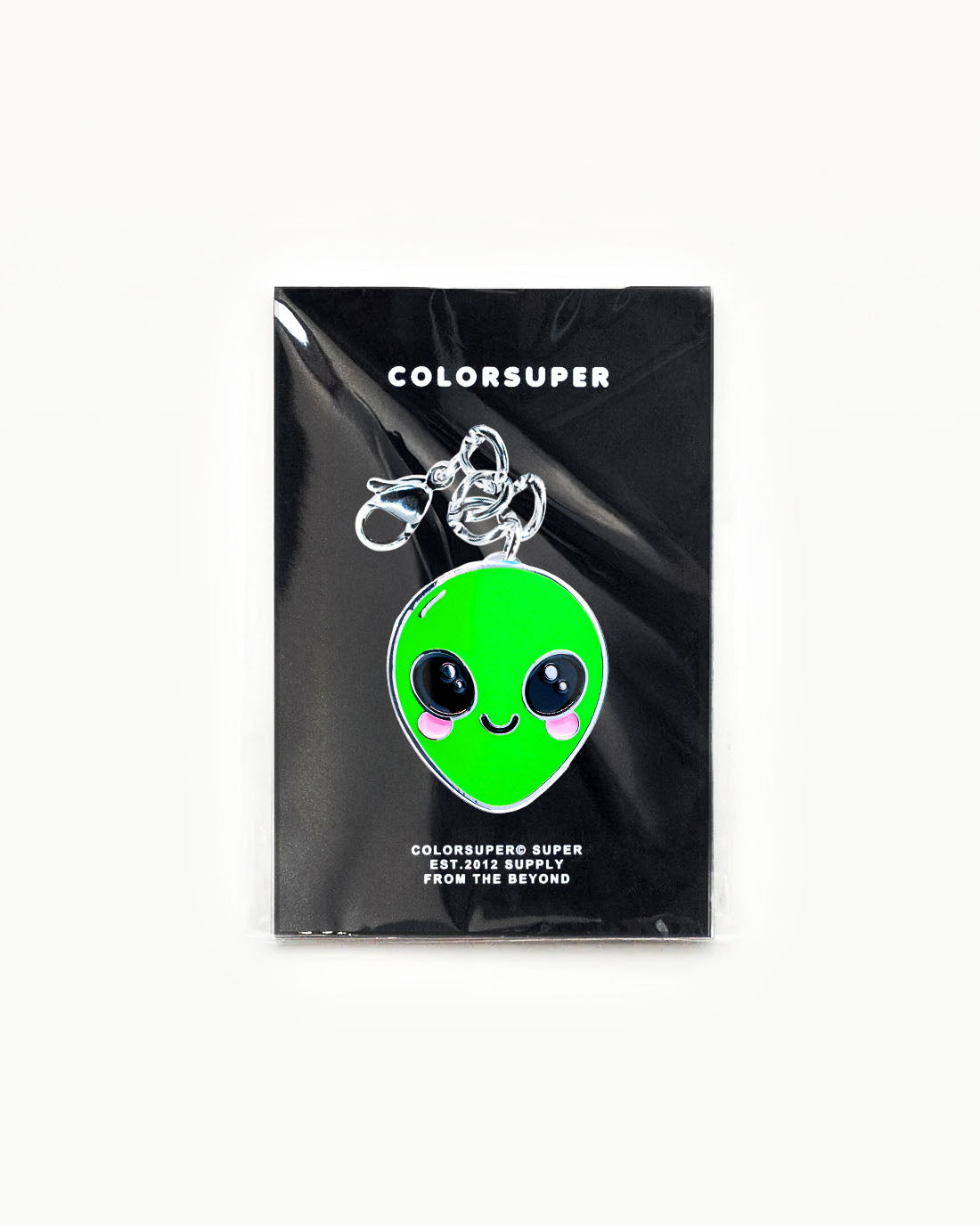 Bikini Charm - Alien Charm, adorable green alien enamel accessory in packaging, perfect for beachwear and geek-chic style. - Alternate view