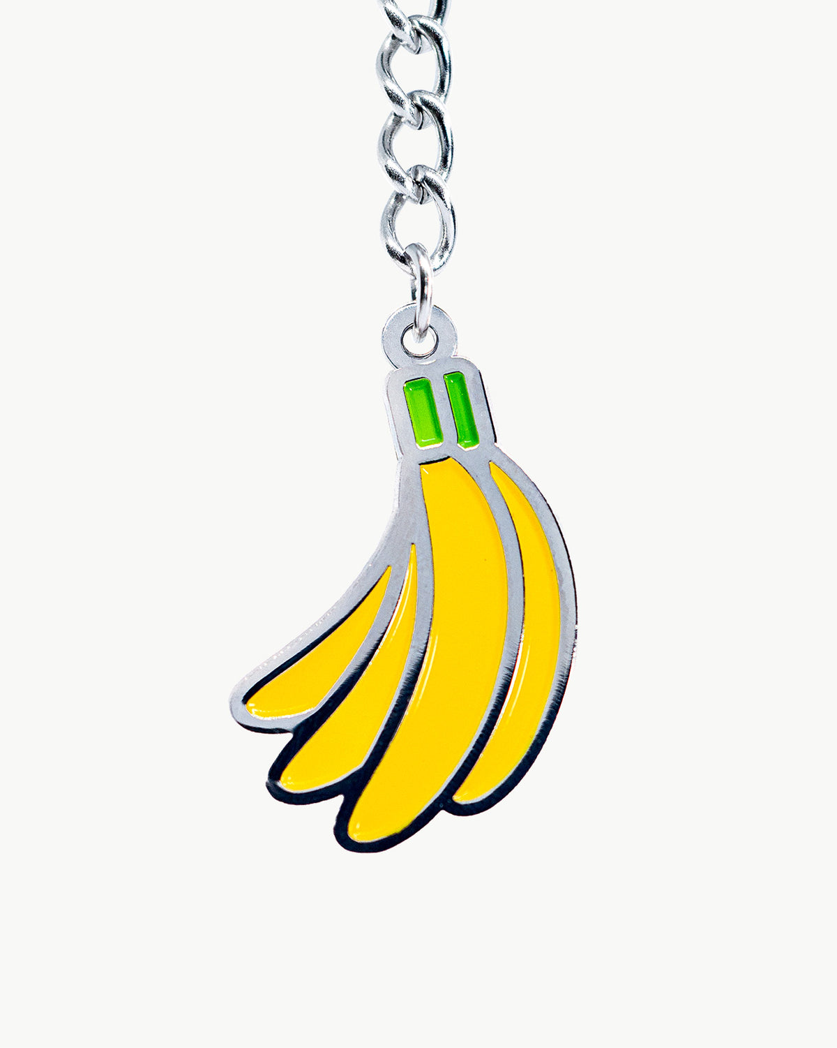 Fruity yellow banana charm pendant, perfect for swimwear and beach bags, adding a fun tropical accessory vibe.