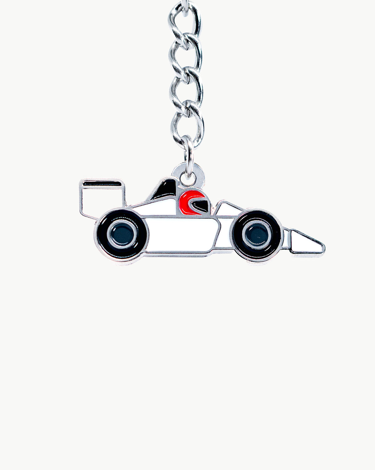 Sleek white race car charm with red-helmeted driver, perfect for motorsports enthusiasts.