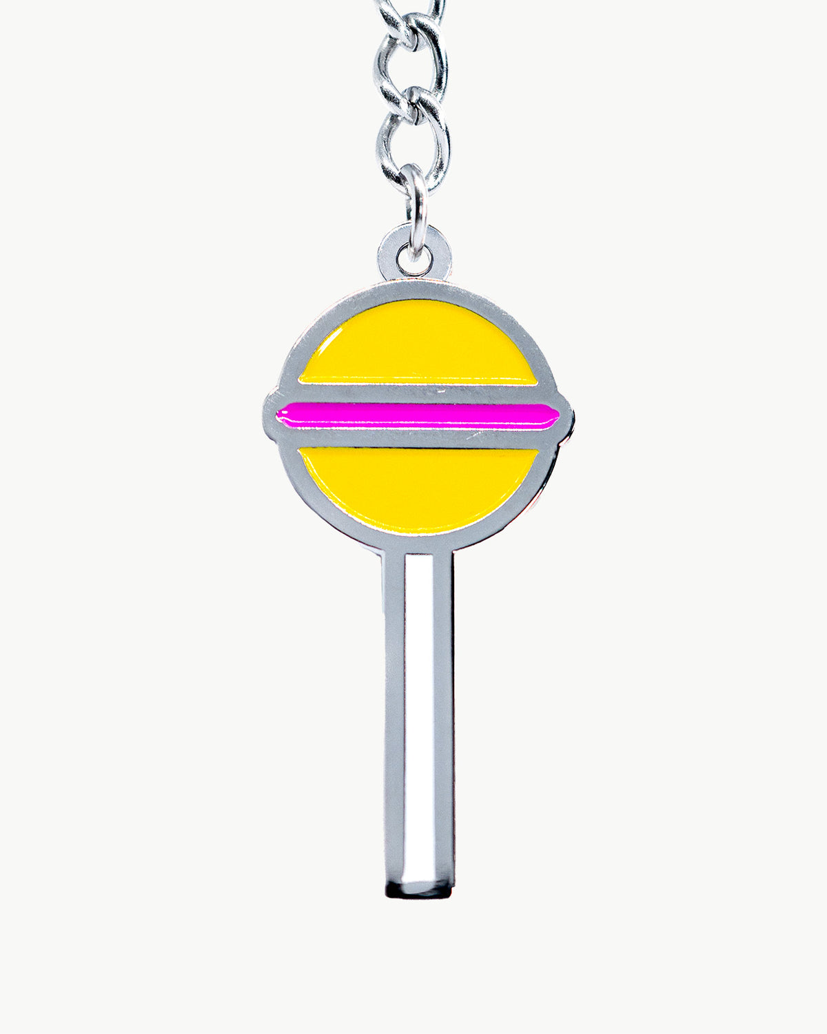 Bikini charm featuring a bright yellow lollipop design, perfect for youthful summer poolside style.