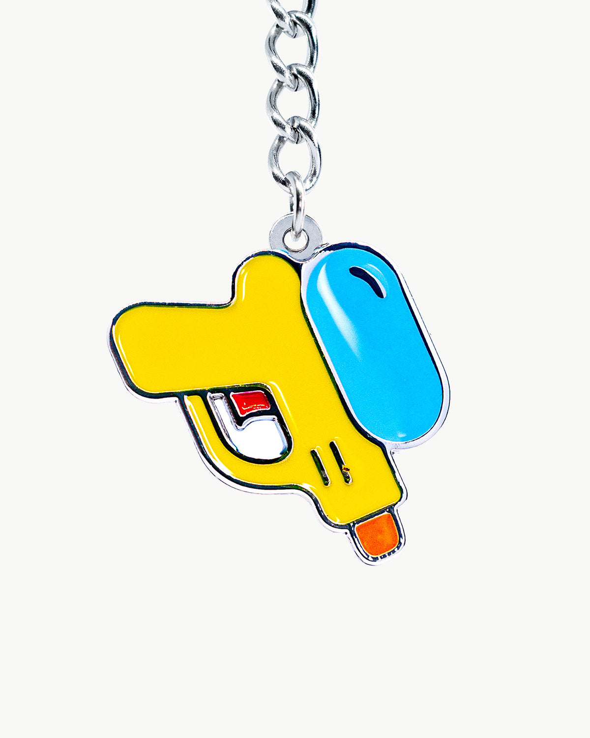 Bikini Charm - Squirter Charm with playful yellow and blue water gun design, perfect for summer accessories.